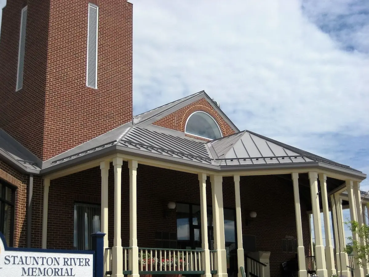 Skilled roofing craftsmen working on a residential roof in Springfield